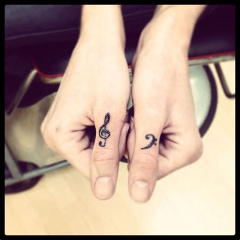 Treble Clef, Bass Clef, musical thumb tatts | Treble clef tattoo, Tattoos, Tattoos and piercings