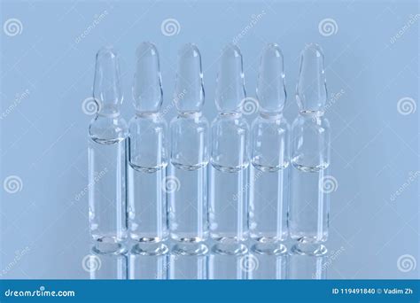 A Vial Ampoule, Container With A Drug On Reflected Surface Stock Photo - Image of ampoule ...