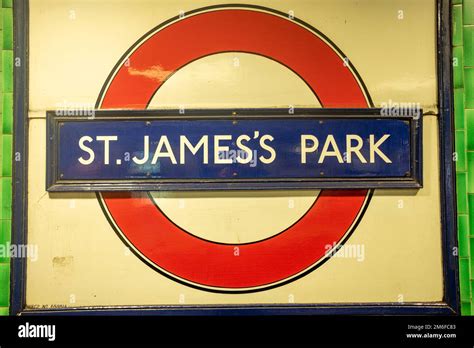 London- December 2022: St James's Park Underground station sign on platform- district line ...