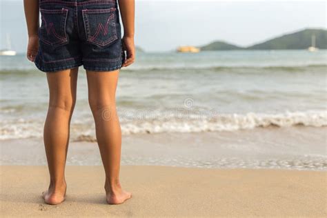 Legs of Children Stand on the Beach Stock Image - Image of sand, family ...