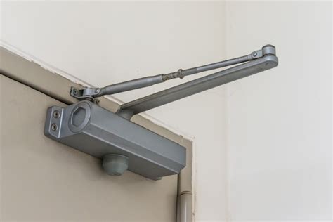 Premium Photo | Automatic hydraulic leaver hinge door closer holder