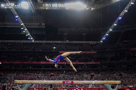 Balance Beam at the Olympics: Guide to Scoring, Moves and More - The New York Times