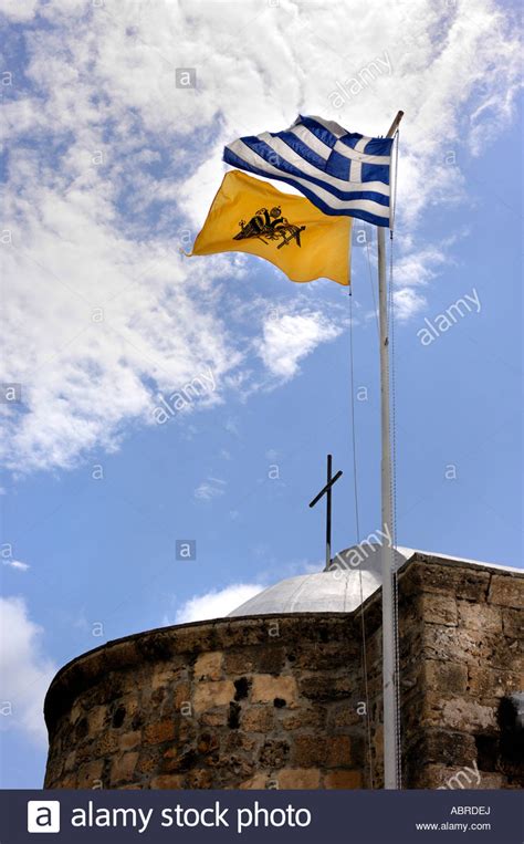 Greek blue flag and a Greek orthodox church flag Stock Photo - Alamy