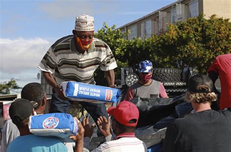 An unlikely truce: Cape Town gangs deliver food amid virus lockdown ...