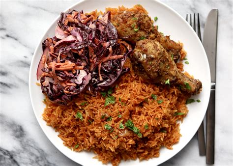 Jollof Rice and Chicken with Coleslaw - Travelandmunchies