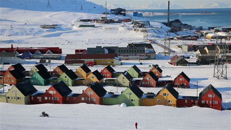 LONGYEARBYEN, SPITSBERGEN, NORWAY - 03 APRIL, 2015: Small Town Longyearbyen Among Snow-capped ...