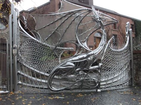 Dragon made from gate in Dublin Ireland suburban housing estate ...