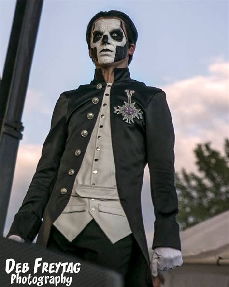a man dressed up in a skeleton costume
