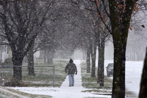 Photos: Minnesotans greet the first winter storm of the season | Minnesota Public Radio News