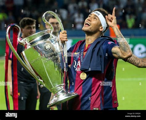 Berlin, Germany. 6th June, 2015. Neymar (C) of FC Barcelona celebrates with the trophy after the ...