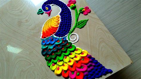 Beautiful & Attractive peacock rangoli by easy rangoli classes - YouTube