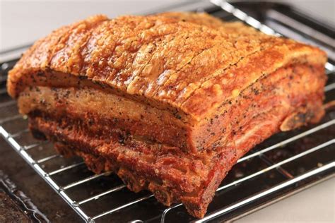 This Slow-Roasted Pork Belly Becomes Tender With a Crispy Skin | Recipe | Pork belly recipes ...