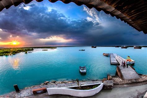 Visit the largest island in the Persian Gulf and also the largest non-independent island in the ...