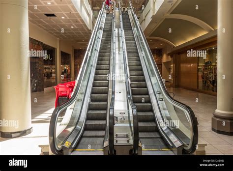 An escalator in a shopping mall Stock Photo - Alamy