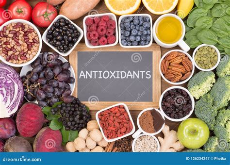 Food Sources of Natural Antioxidants Such As Fruits, Vegetables, Nuts and Cocoa Powder Stock ...