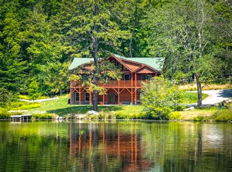 LAKEFRONT LOG CABIN, Like New – 5.85 Acres - Special Finds, Unique Homes