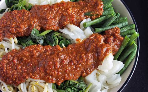 Pecel is a popular Indonesian peanut sauce that is often served as a street food with vegetables ...