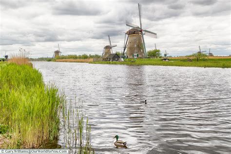 Welcoming sails of Kinderdijk, Netherlands - Our World for You