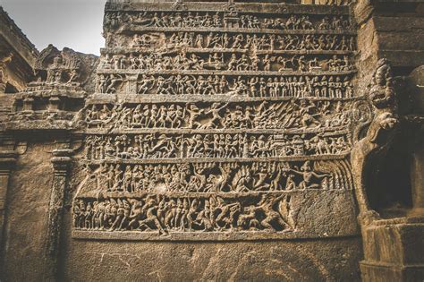 Carved pictures on stone wall of ancient temple · Free Stock Photo