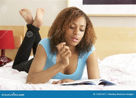 Teenage Girl Writing in Diary in Bedroom Stock Image - Image of indoors, female: 11501437