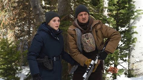 Wind River Elizabeth Olsen and Jeremy Renner