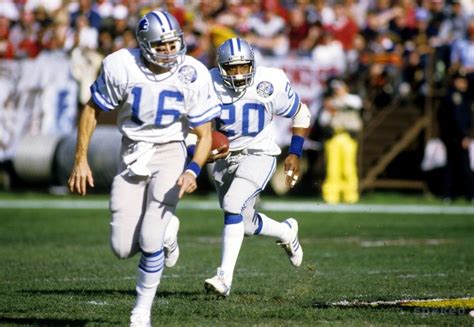 Detroit Lions quarterback Gary Danielson (16) leads a block for running back Billy Sims (20 ...