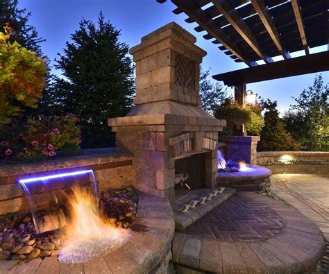 Outdoor Fireplace And Waterfall Designs | Backyard water feature ...