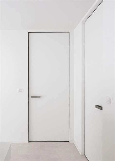 Invisible interior doors, custom-made with a invisible aluminium door frame. The frame is ...