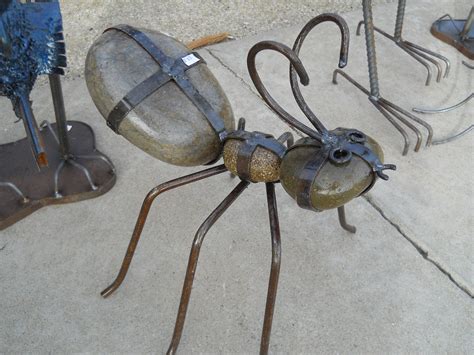 Ant made of steel and rocks | Scrap metal art, Metal yard art, Metal ...