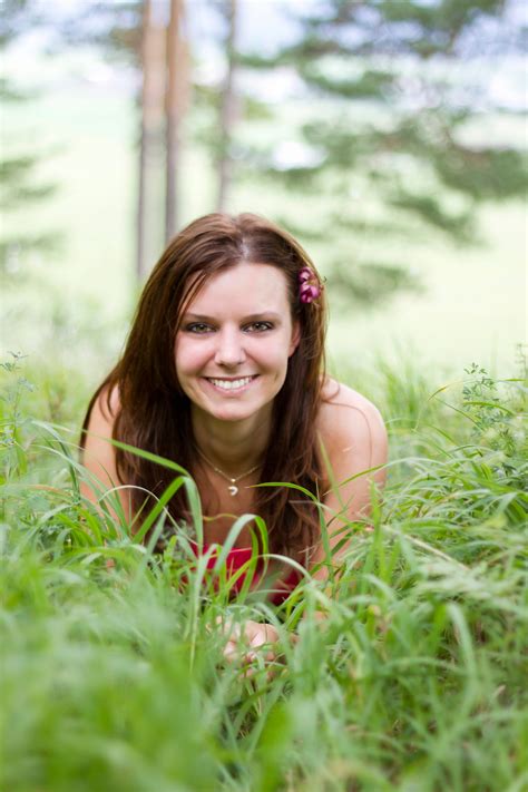 Young Girl Laying In The Grass Free Stock Photo - Public Domain Pictures