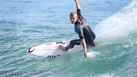 Australian surfer Mick Fanning catches a wave a week after shark attack | Daily Mail Online