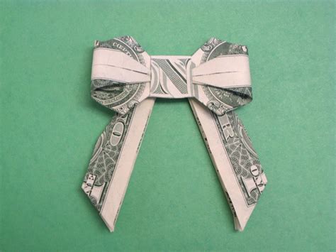 Dollar bill bow | Money origami, Dollar origami, Dollar bill origami