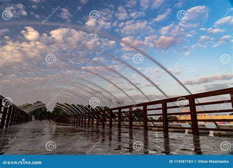 Bridge with Fountain in the Aspire Park during Dramatic Sunset in Doha ...