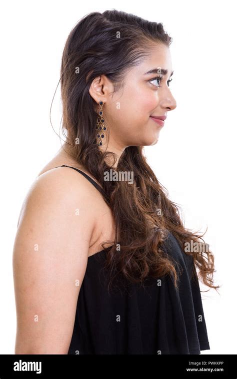 Profile view of young beautiful Indian woman Stock Photo - Alamy