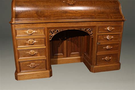 Antique American Victorian roll top desk in burl walnut