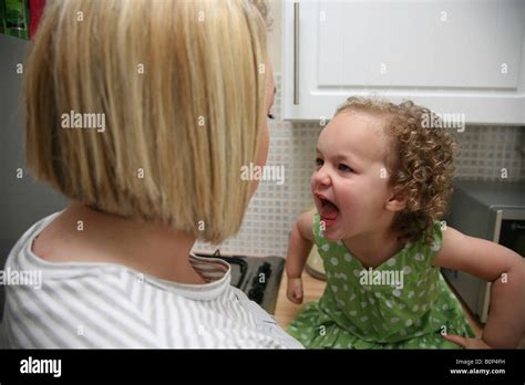 Toddler having a temper tantrum and screaming at her mother Stock Photo - Alamy