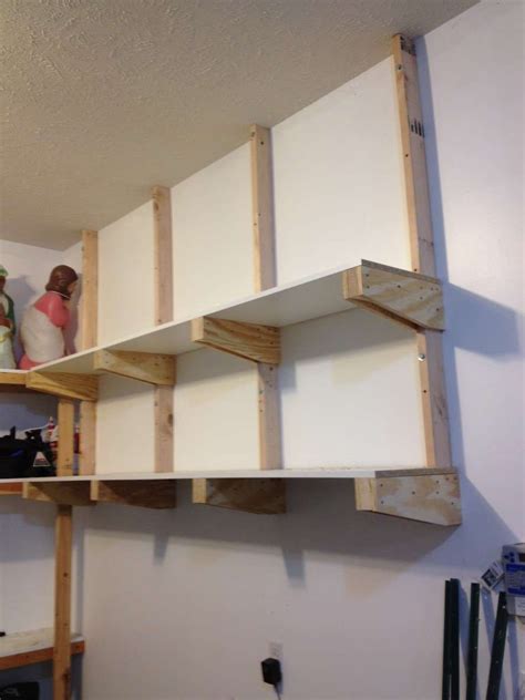 diy overhead garage storage shelf | Garage storage shelves diy, Garage wall shelving, Diy ...