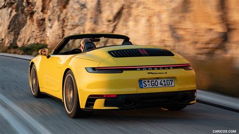 2020 Porsche 911 Carrera S Cabriolet (Color: Racing Yellow) | Rear Three-Quarter