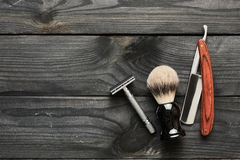 Premium Photo | Vintage barber shop tools on wooden background