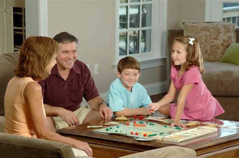 File:Family playing a board.jpg