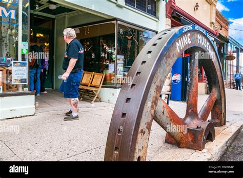 Old mine workings wheel outside the Jerome Mine Museum on Main Street ...