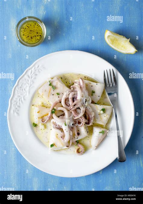 rustic mediterranean grill squid Stock Photo - Alamy