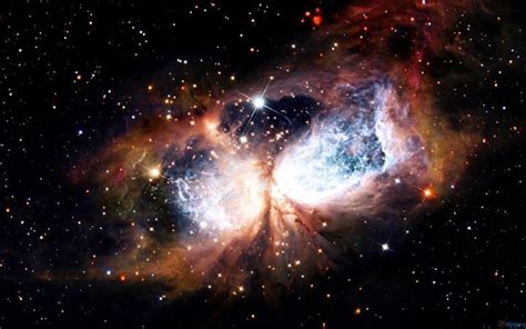 The bipolar star-forming region, called Sharpless 2-106, looks like a ...