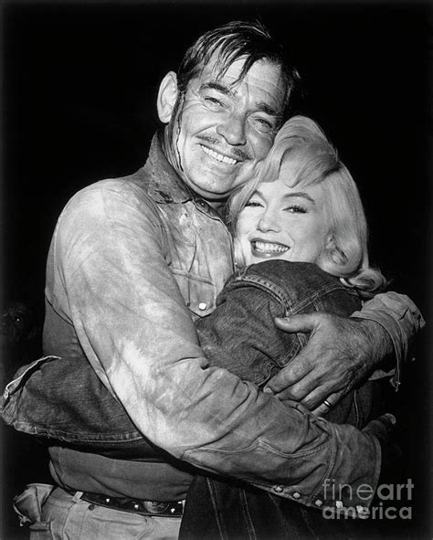 Clark Gable Embracing Marilyn Monroe by Bettmann