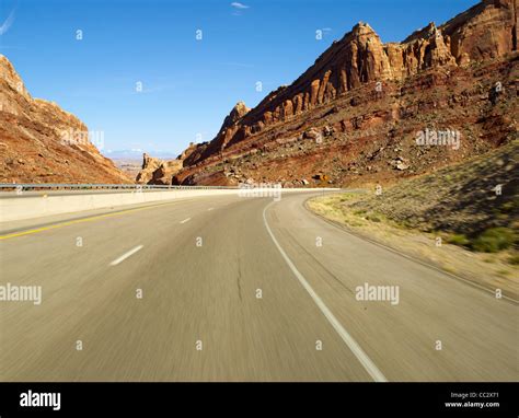 USA, Utah, Interstate 70 cutting through San Rafael Swell Stock Photo ...