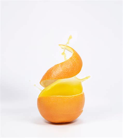 Orange peel with fresh juice · Free Stock Photo