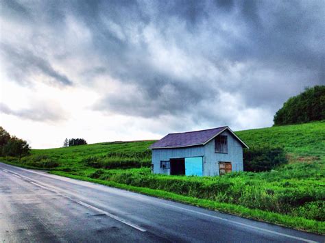 White house beside concrete road under gray clouds, hokkaido HD wallpaper | Wallpaper Flare