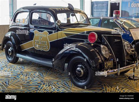 Detroit, Michigan - A 1937 Ford Model 74 Michigan State Police car on ...