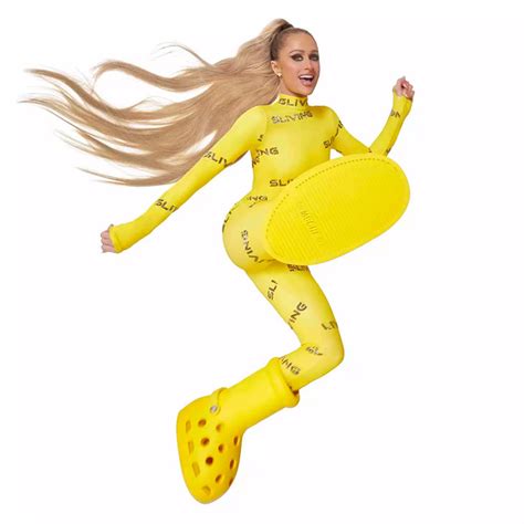 Paris Hilton Models MSCHF x Crocs Big Yellow Boots