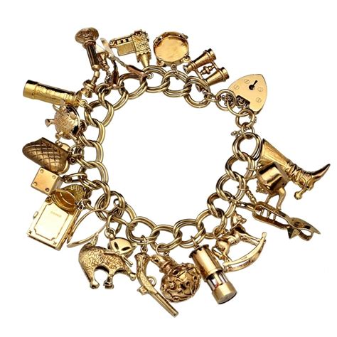 9ct Yellow Gold Ladies Charm Bracelet 21 Charms - 64.40 Grams| Miltons Diamonds